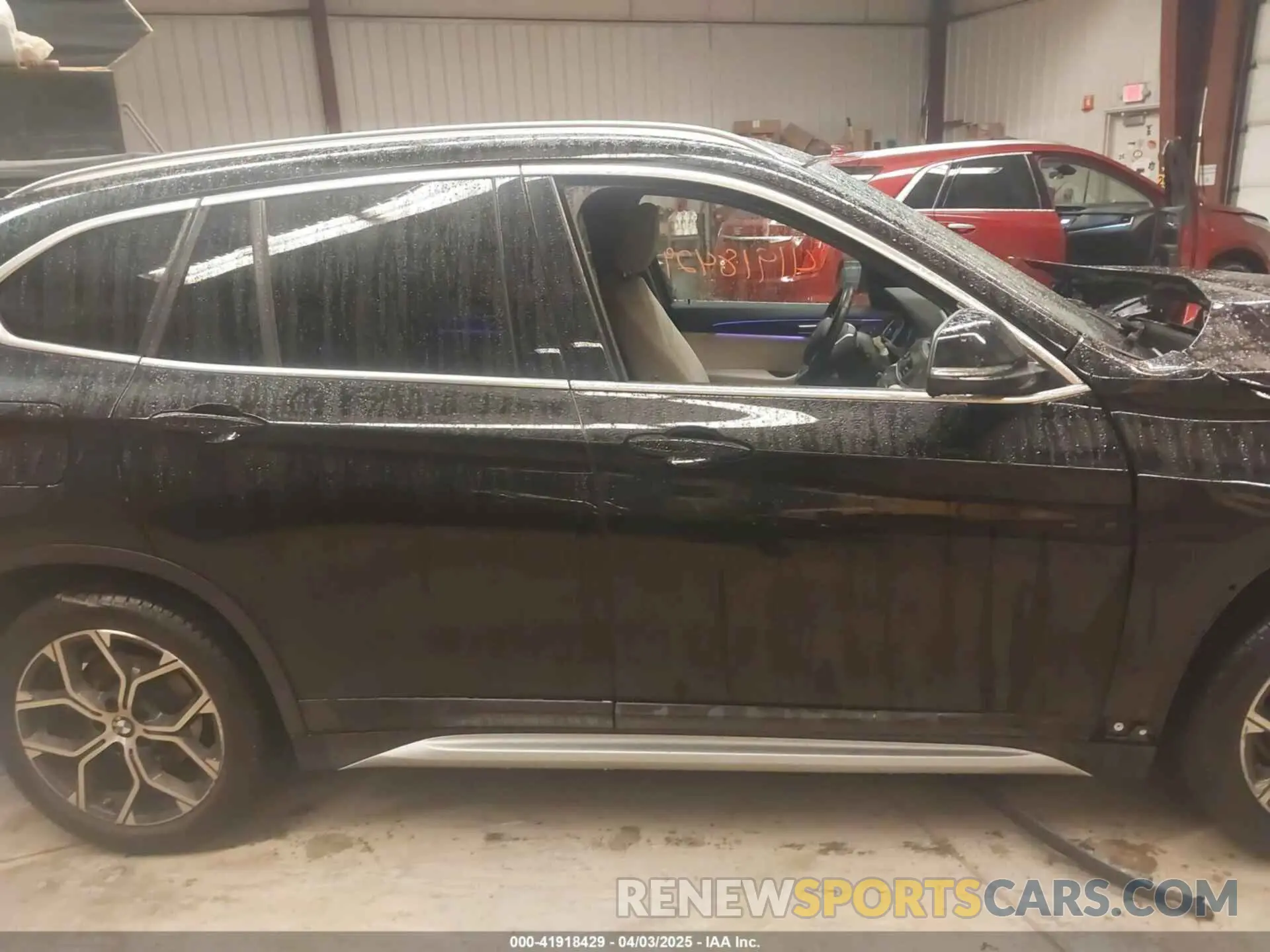 14 Photograph of a damaged car WBXJG9C00M5T76421 BMW X1 2021