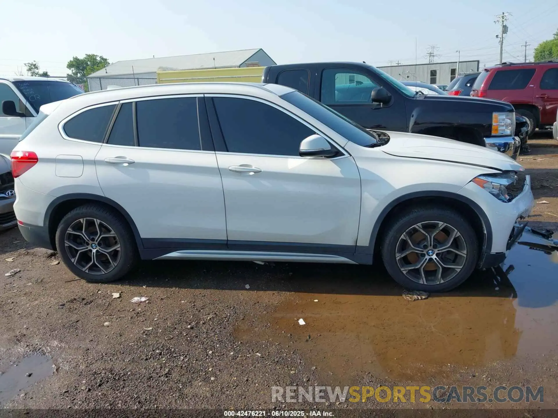14 Photograph of a damaged car WBXJG9C02M3M42379 BMW X1 2021