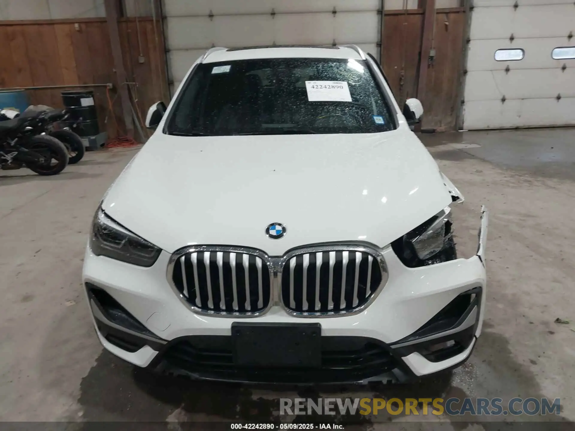 12 Photograph of a damaged car WBXJG9C04M5T82884 BMW X1 2021
