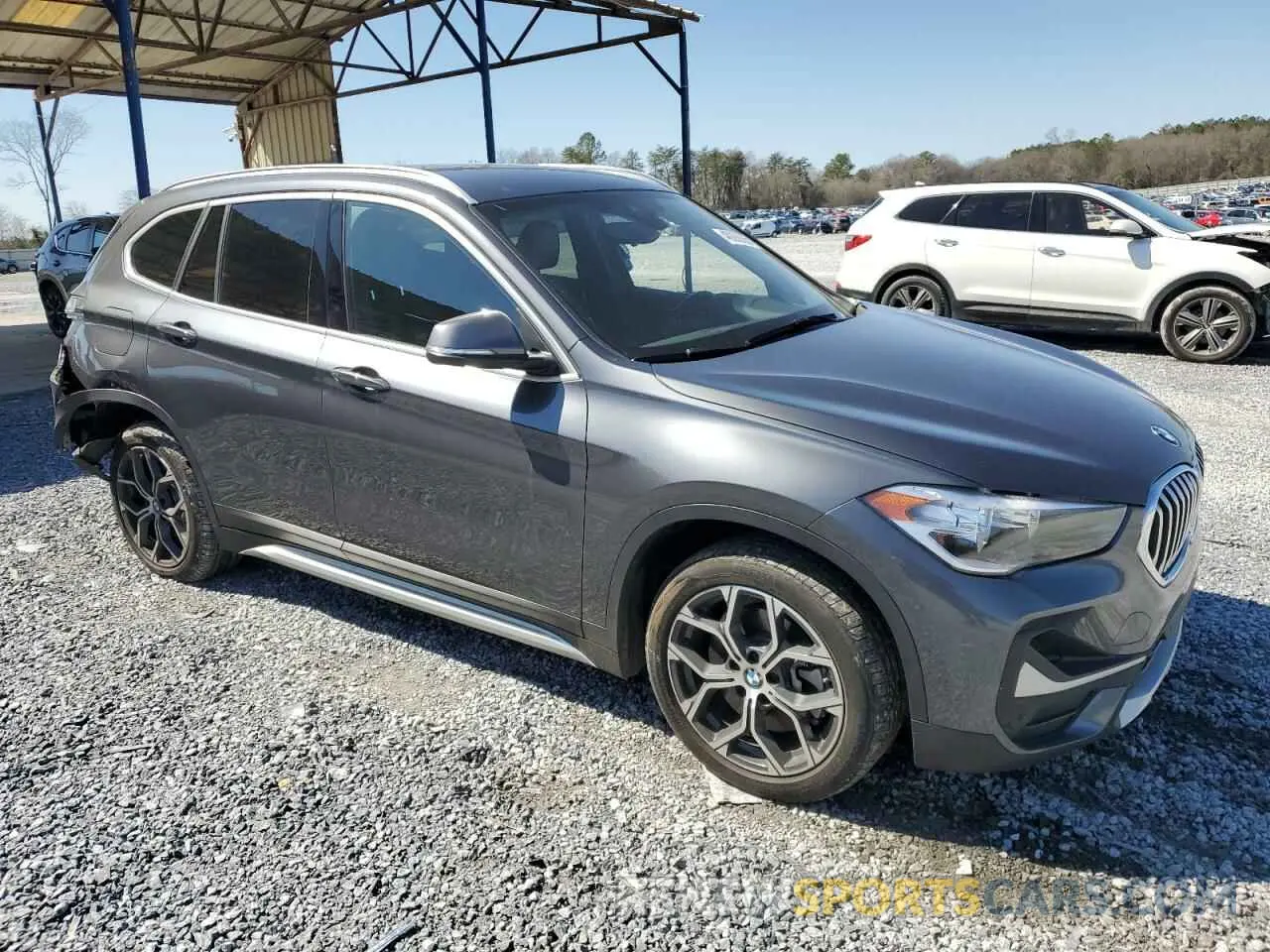 4 Photograph of a damaged car WBXJG7C00N5U61457 BMW X1 2022