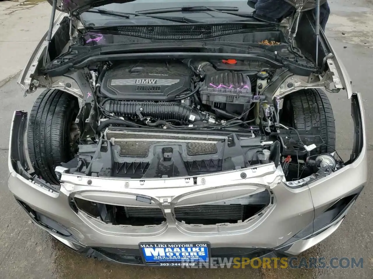 12 Photograph of a damaged car WBXJG9C0XN5V03922 BMW X1 2022