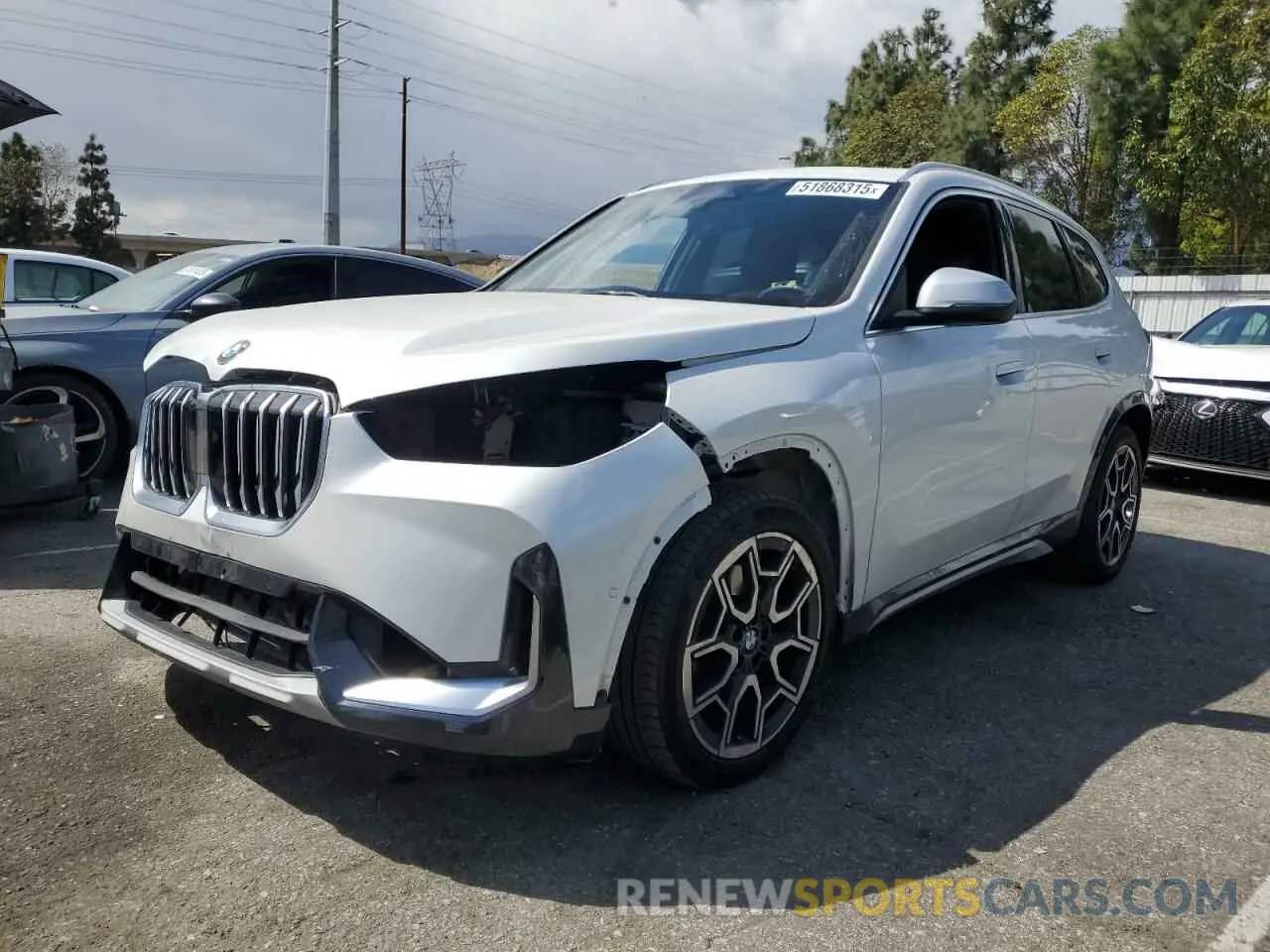 1 Photograph of a damaged car WBX73EF02P5W88156 BMW X1 2023