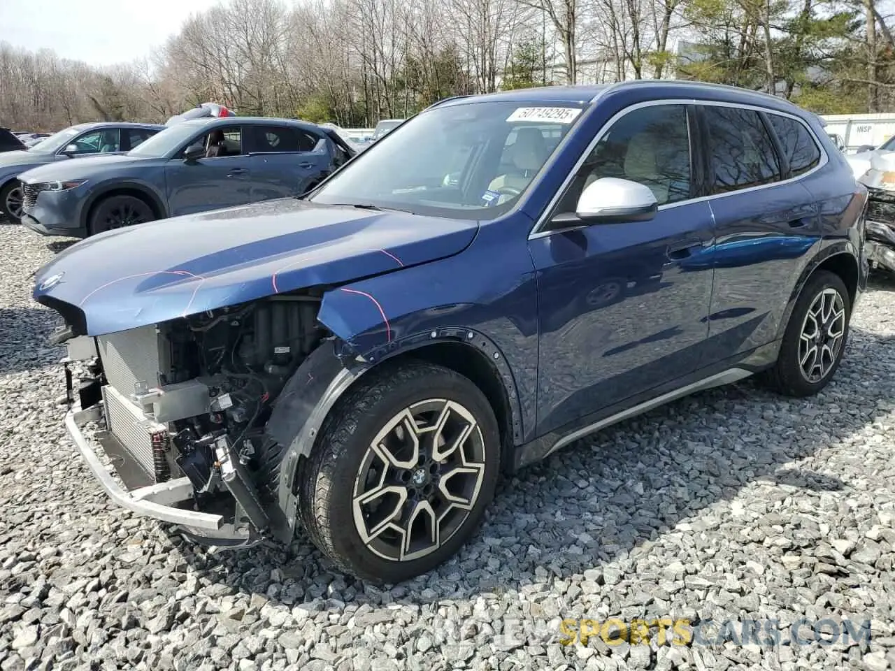 1 Photograph of a damaged car WBX73EF05P5Y21721 BMW X1 2023