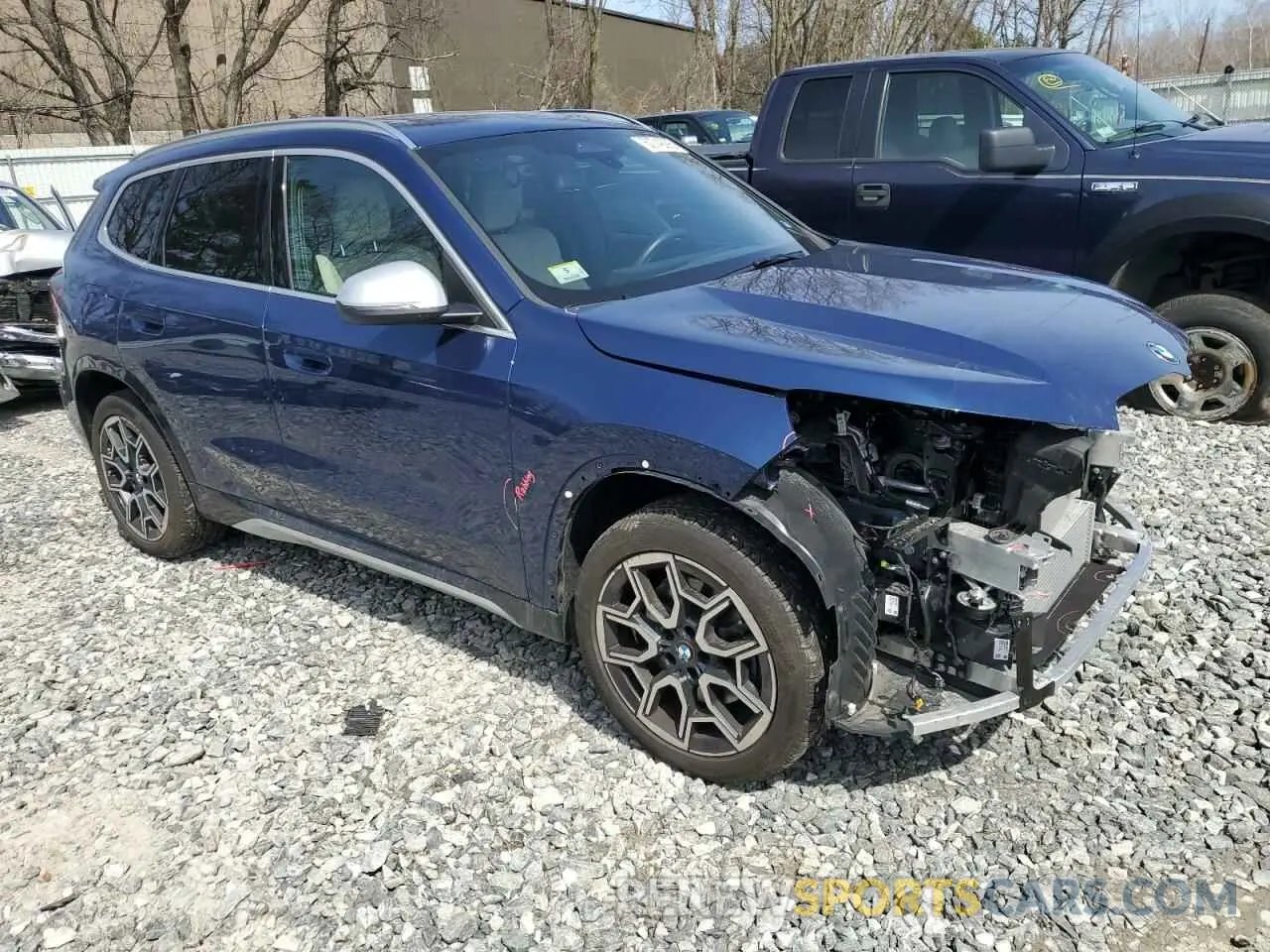 4 Photograph of a damaged car WBX73EF05P5Y21721 BMW X1 2023