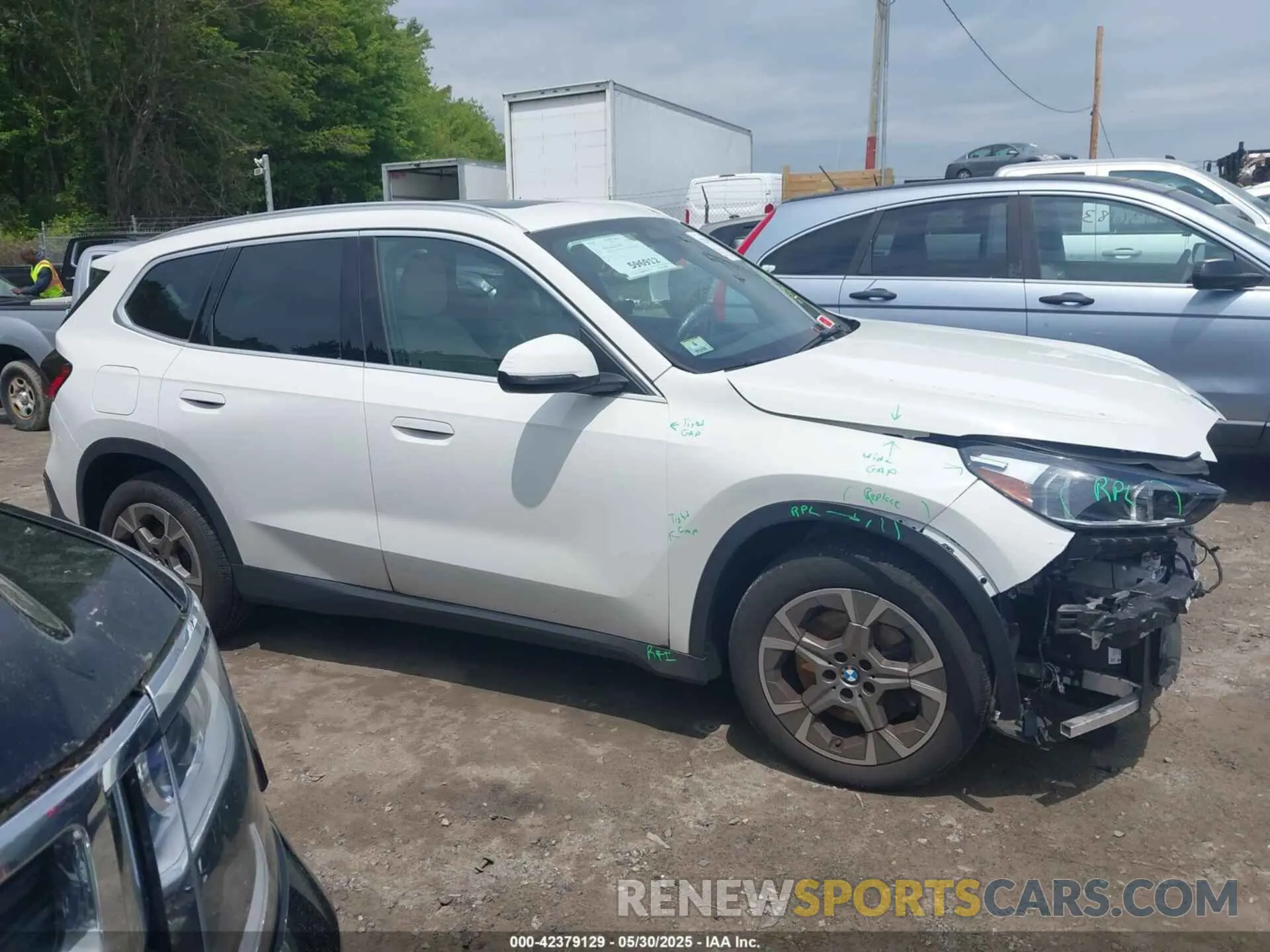 14 Photograph of a damaged car WBX73EF06P5W91223 BMW X1 2023