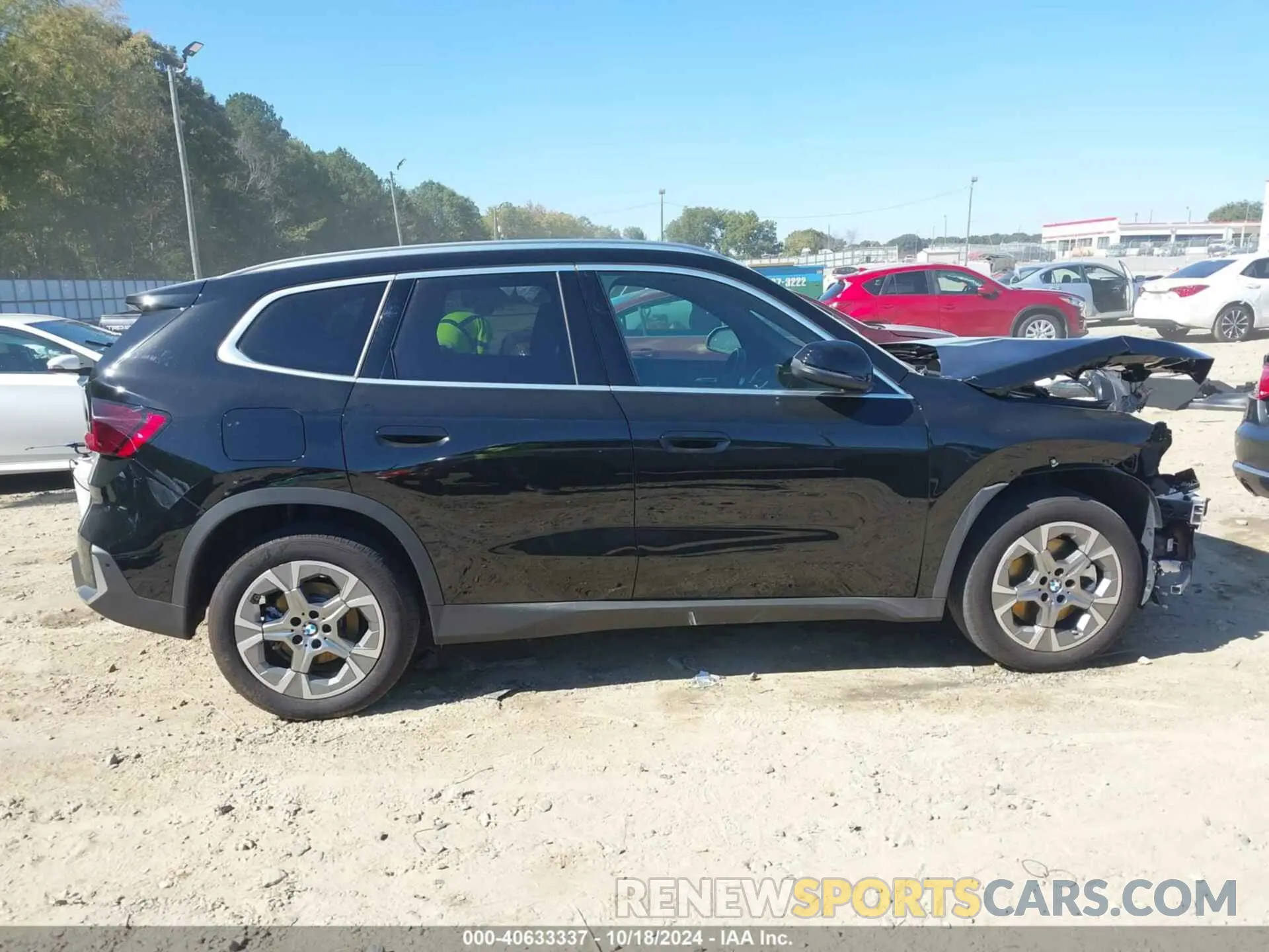 14 Photograph of a damaged car WBX73EF06P5X24866 BMW X1 2023