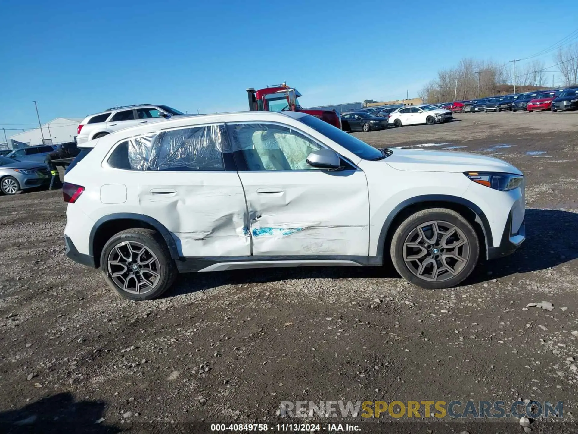 13 Photograph of a damaged car WBX73EF08P5V84724 BMW X1 2023