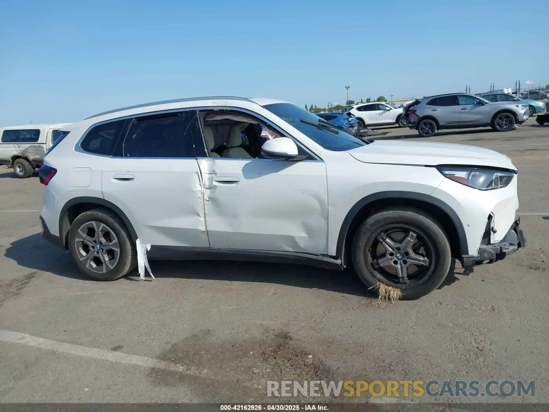 13 Photograph of a damaged car WBX73EF08P5X21175 BMW X1 2023