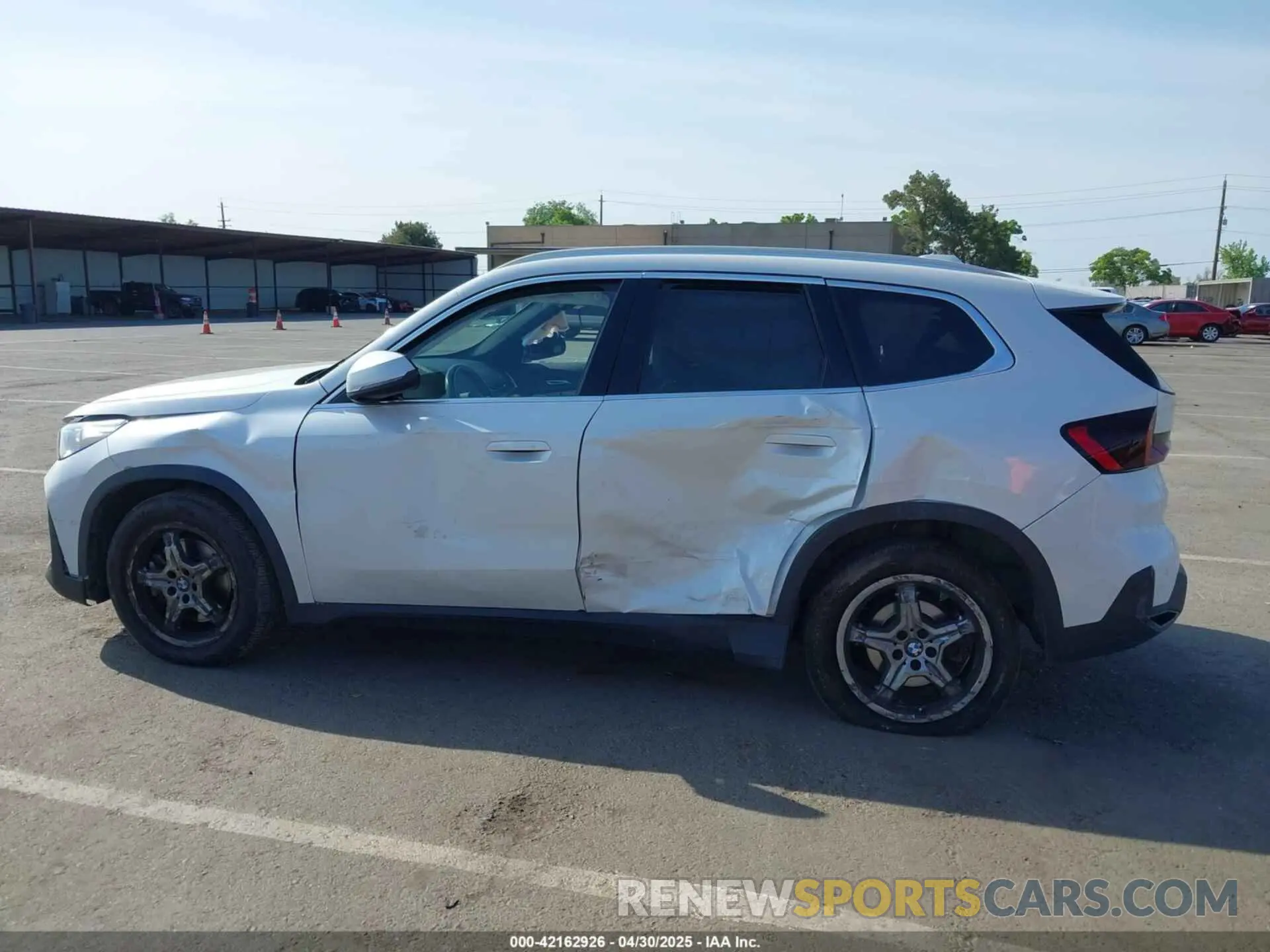 14 Photograph of a damaged car WBX73EF08P5X21175 BMW X1 2023