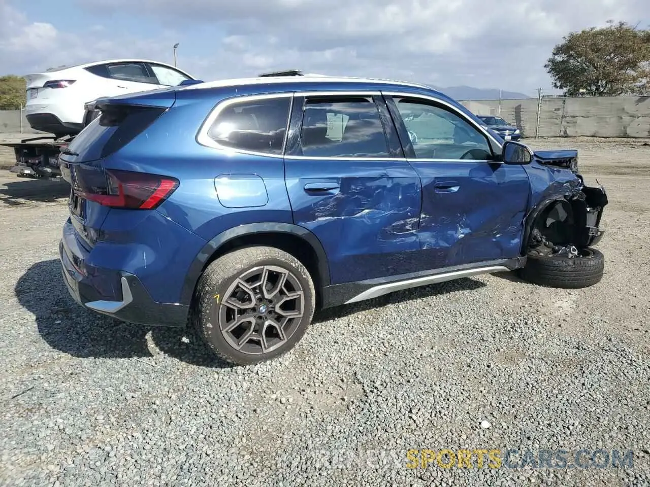 3 Photograph of a damaged car WBX73EF08P5X88052 BMW X1 2023