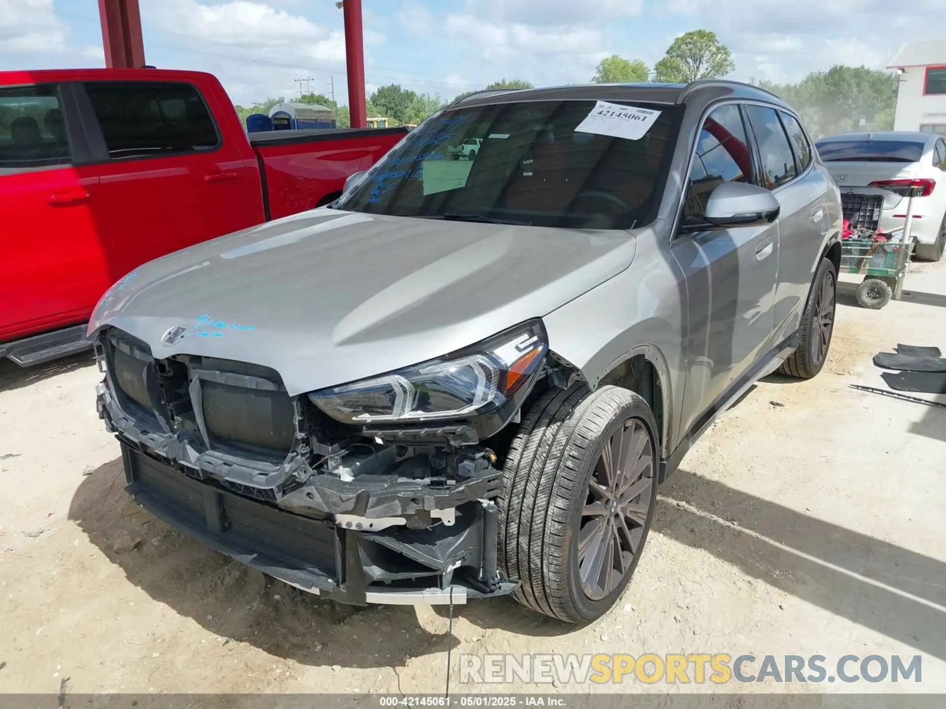 2 Photograph of a damaged car WBX73EF09P5W51069 BMW X1 2023