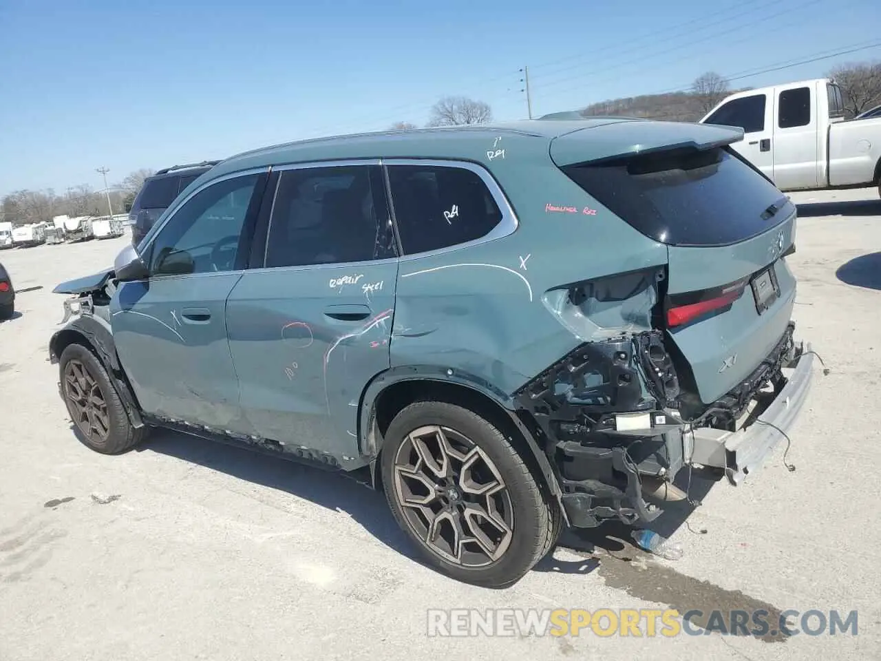 2 Photograph of a damaged car WBX73EF00R5Z01009 BMW X1 2024