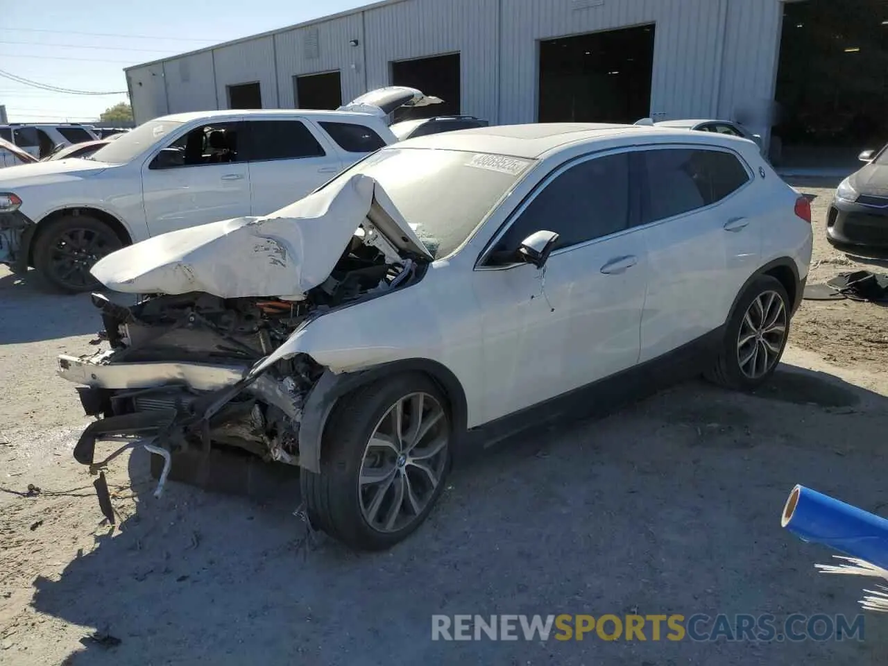 1 Photograph of a damaged car WBXYH9C01L5P45989 BMW X2 2020