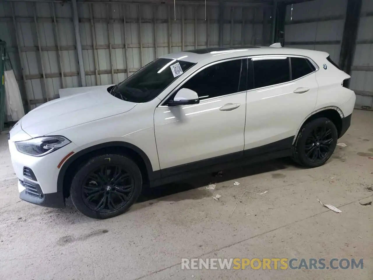 1 Photograph of a damaged car WBXYJ1C04N5U30077 BMW X2 2022