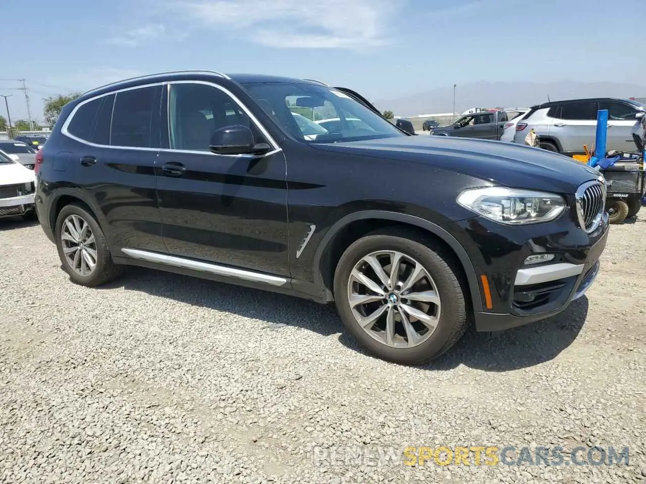 4 Photograph of a damaged car 5UXTR7C50KLF25890 BMW X3 2019