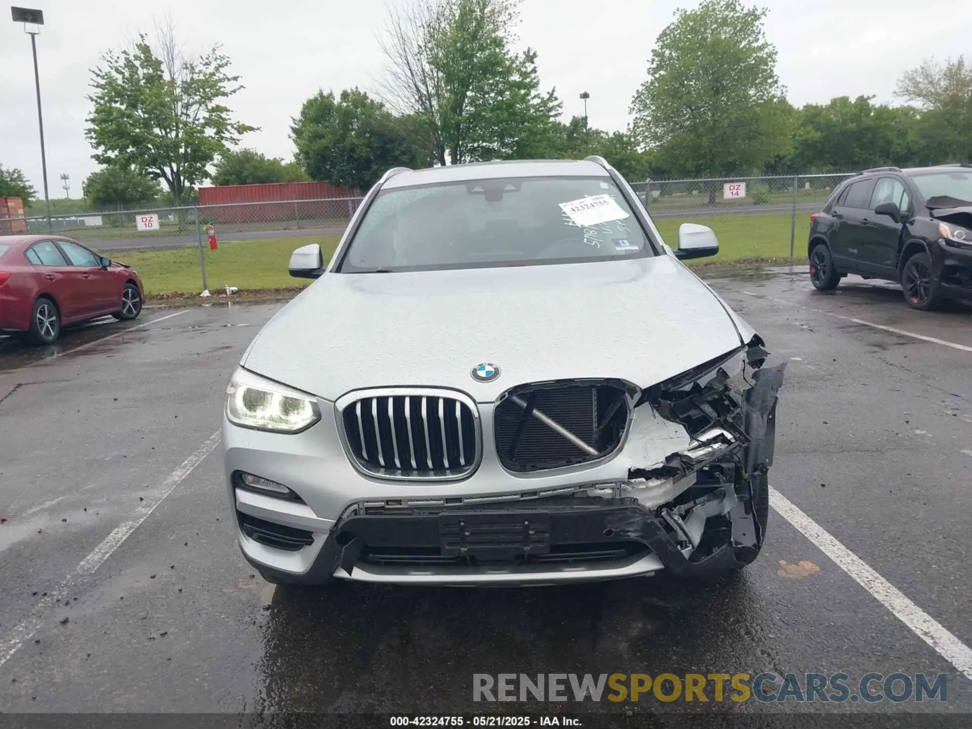 12 Photograph of a damaged car 5UXTR7C50KLF33892 BMW X3 2019