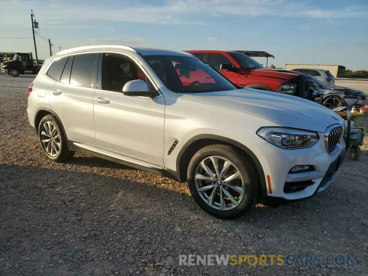 4 Photograph of a damaged car 5UXTR7C50KLR46862 BMW X3 2019