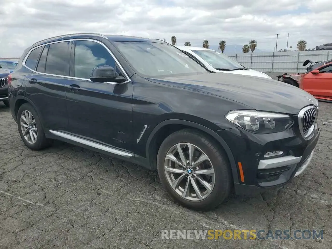 4 Photograph of a damaged car 5UXTR7C51KLE97226 BMW X3 2019