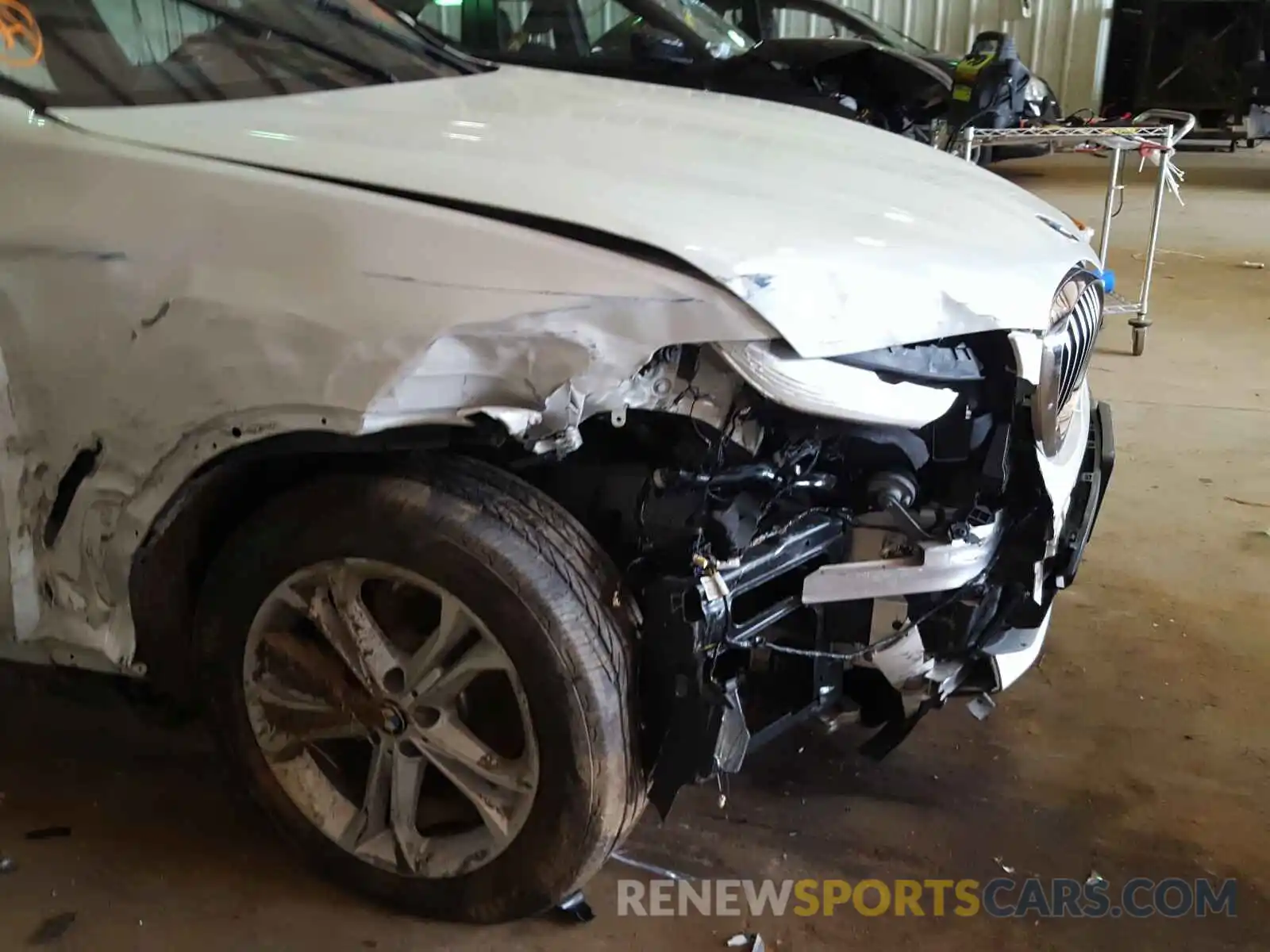 9 Photograph of a damaged car 5UXTR7C51KLF35618 BMW X3 2019