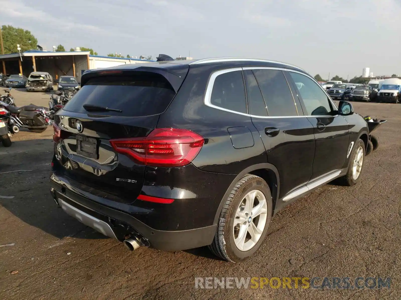 4 Photograph of a damaged car 5UXTR7C51KLR39516 BMW X3 2019