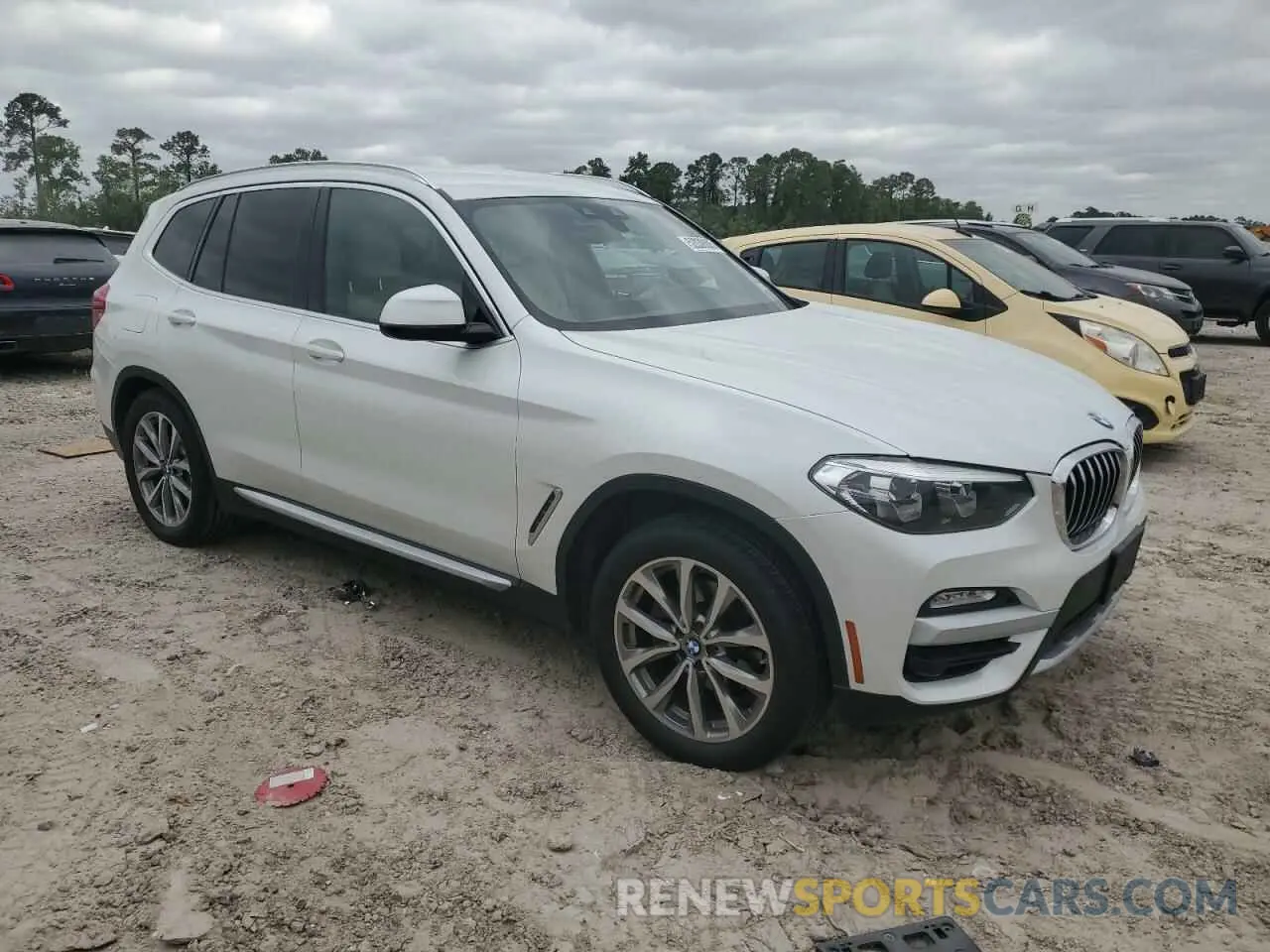 4 Photograph of a damaged car 5UXTR7C52KLF37667 BMW X3 2019