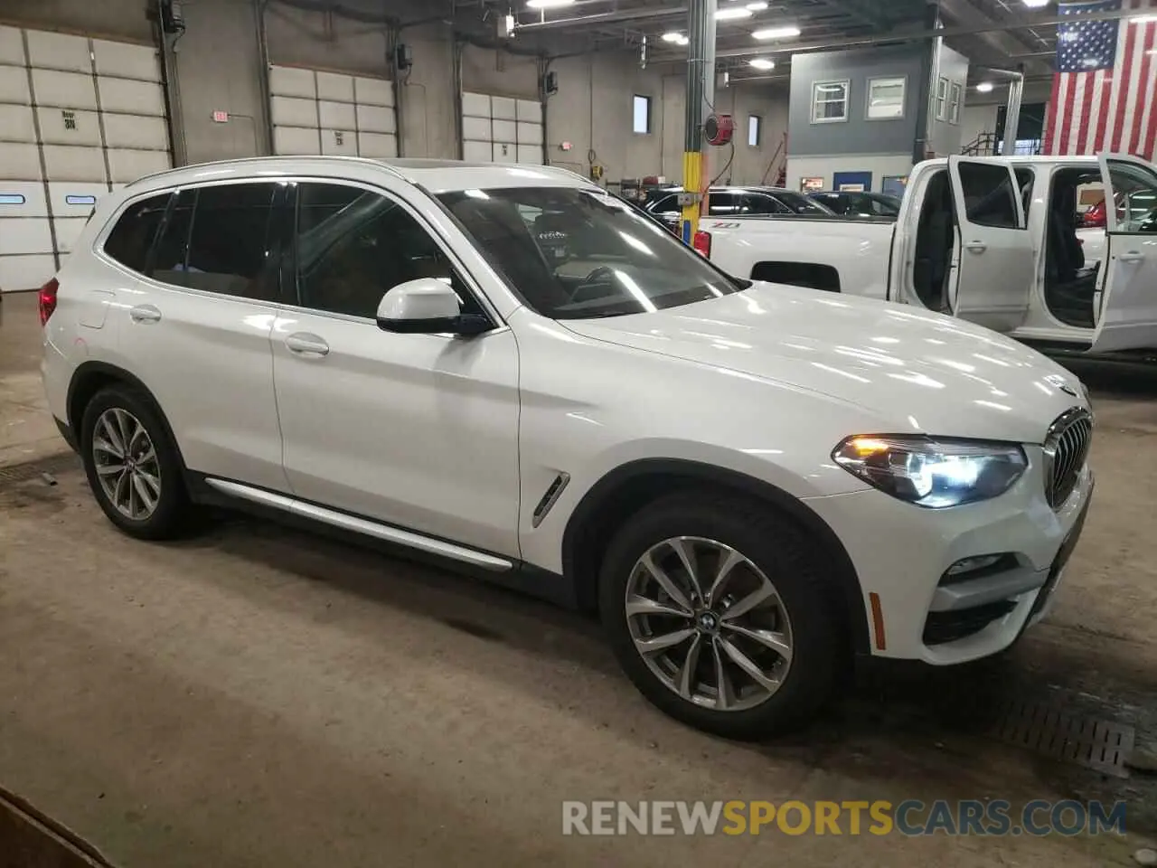 4 Photograph of a damaged car 5UXTR7C53KLR49786 BMW X3 2019