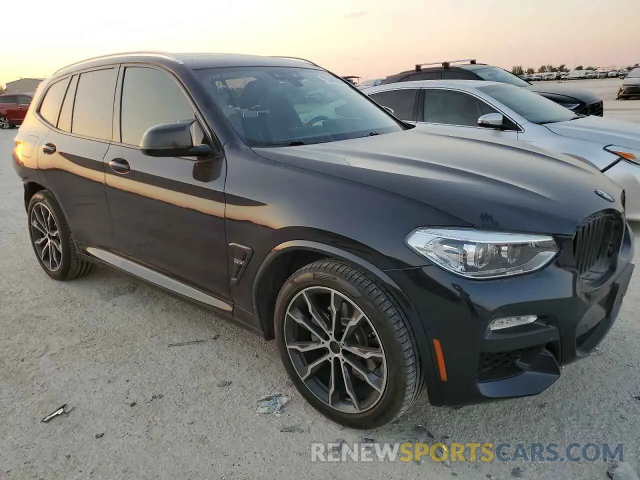 4 Photograph of a damaged car 5UXTR7C55KLF34553 BMW X3 2019