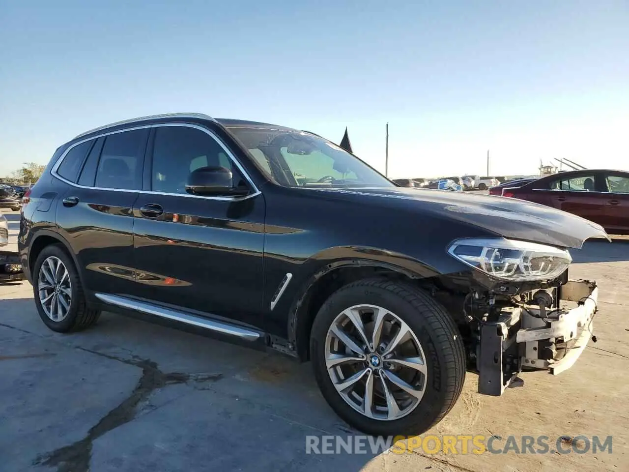 4 Photograph of a damaged car 5UXTR7C56KLE94886 BMW X3 2019