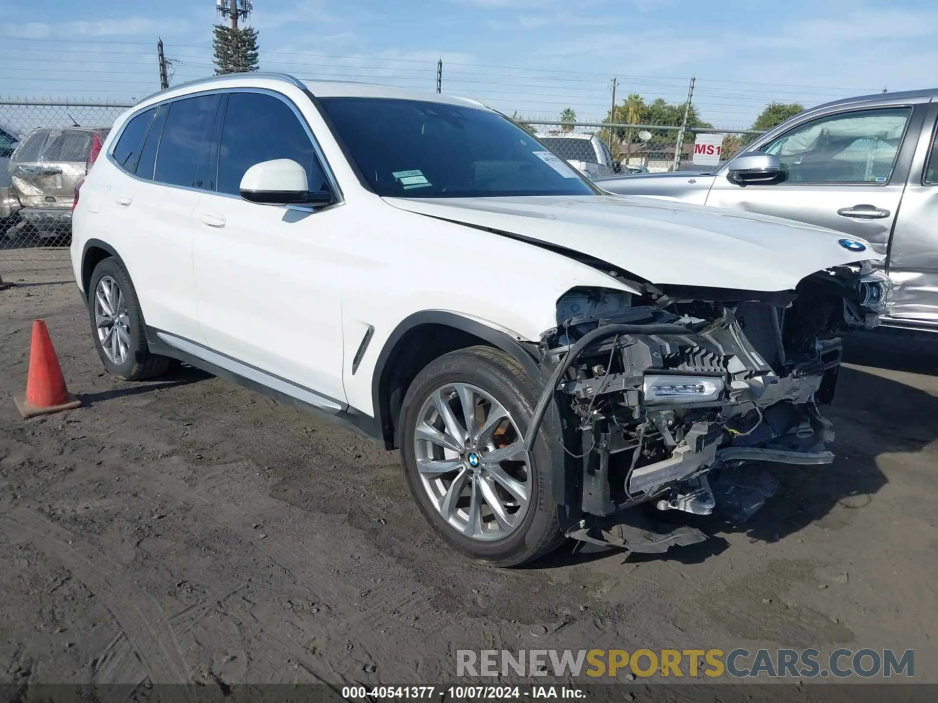 14 Photograph of a damaged car 5UXTR7C57KLF24302 BMW X3 2019