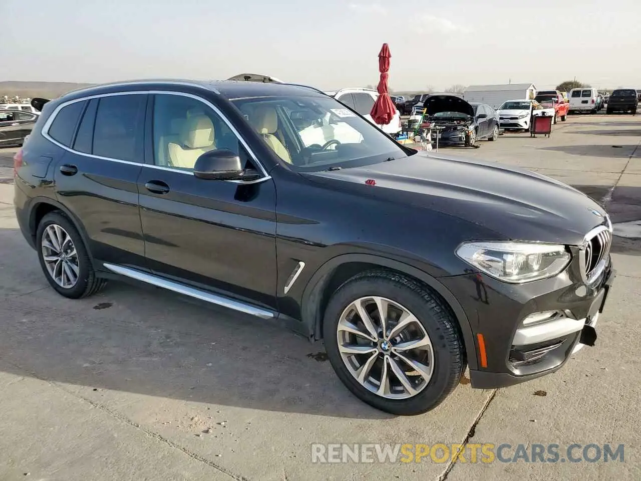 4 Photograph of a damaged car 5UXTR7C57KLF31654 BMW X3 2019