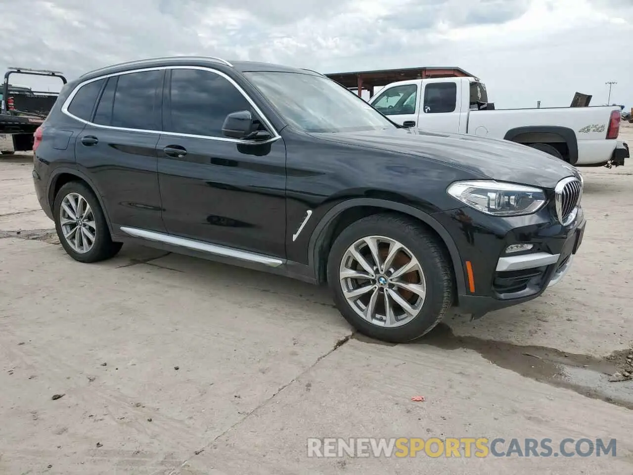 4 Photograph of a damaged car 5UXTR7C58KLE88281 BMW X3 2019