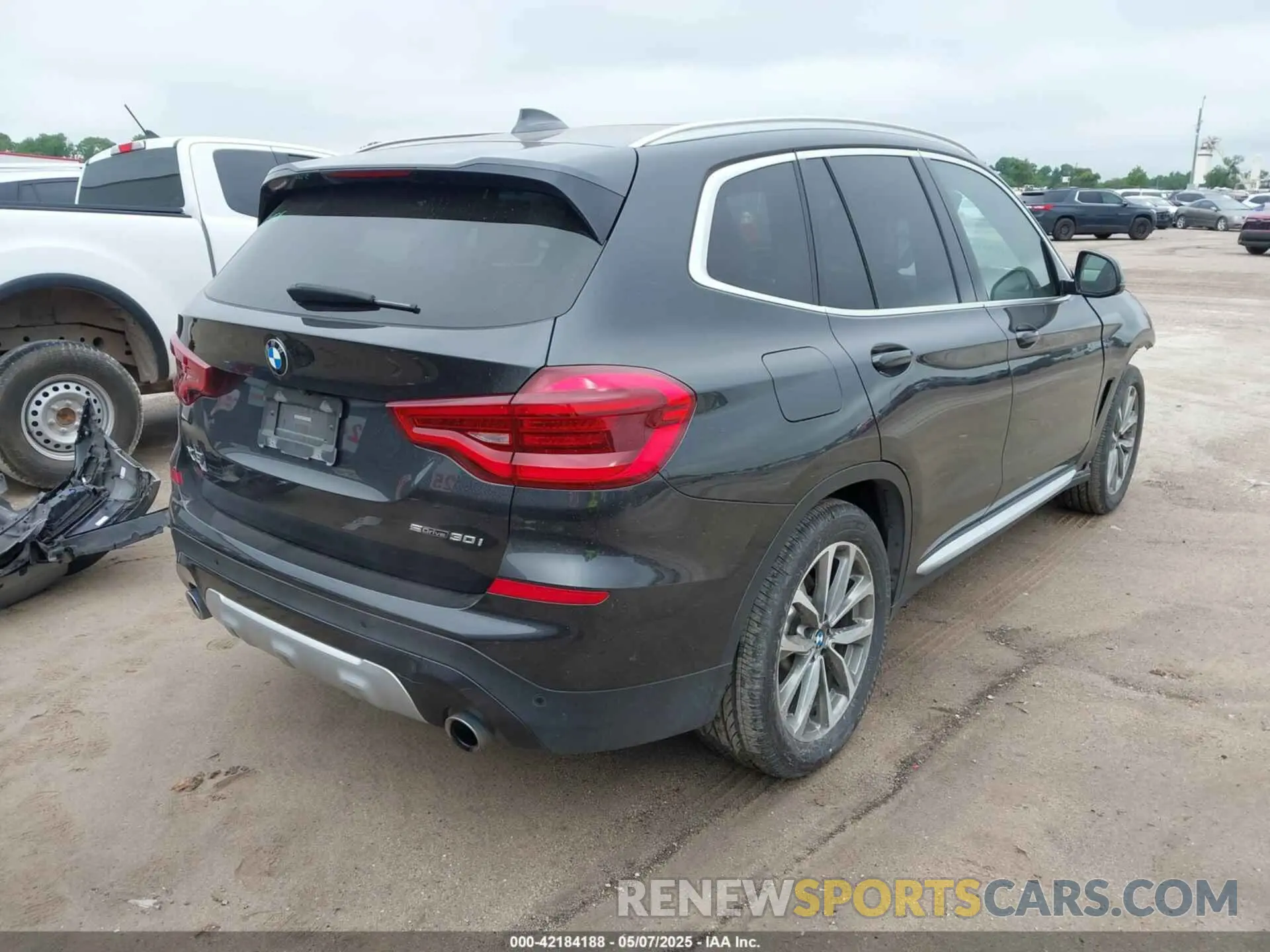4 Photograph of a damaged car 5UXTR7C58KLE96414 BMW X3 2019