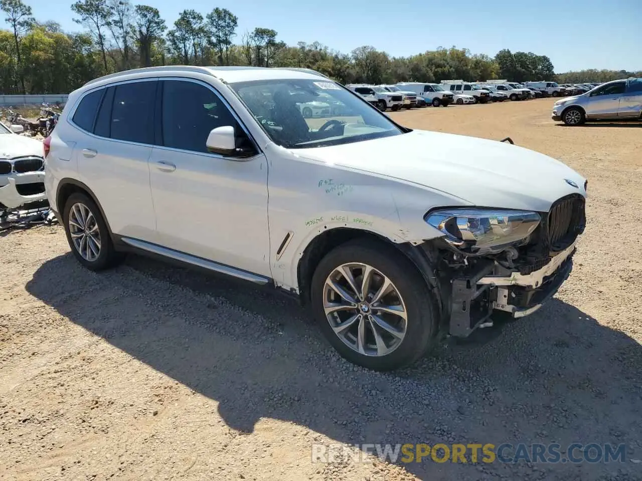 4 Photograph of a damaged car 5UXTR7C58KLF35339 BMW X3 2019