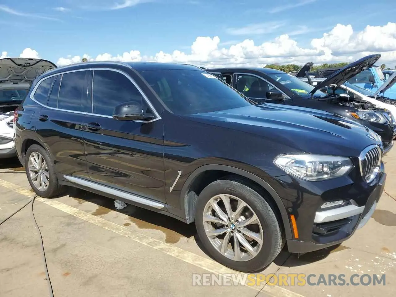 4 Photograph of a damaged car 5UXTR7C59KLE94316 BMW X3 2019
