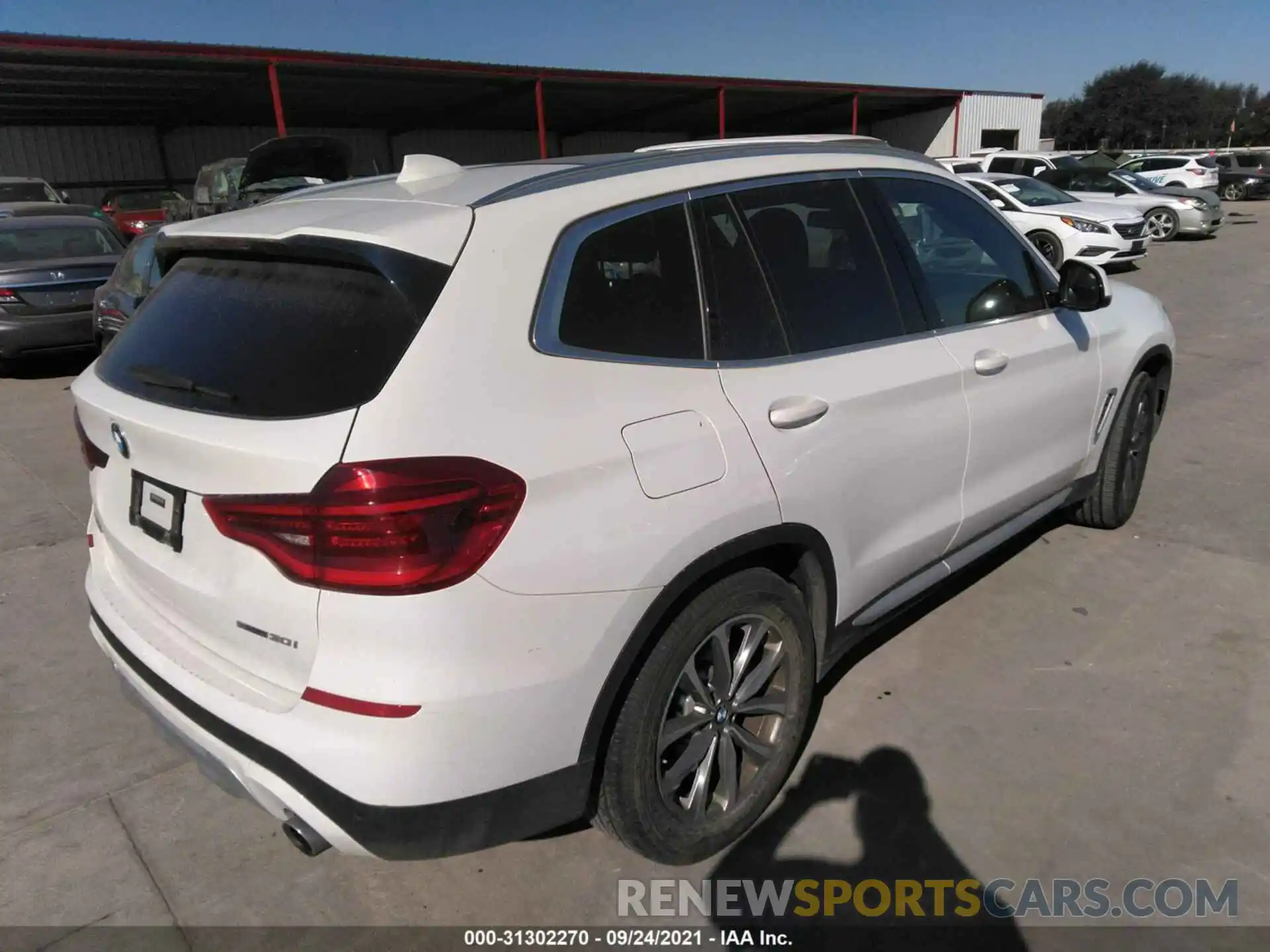 4 Photograph of a damaged car 5UXTR7C59KLR50148 BMW X3 2019