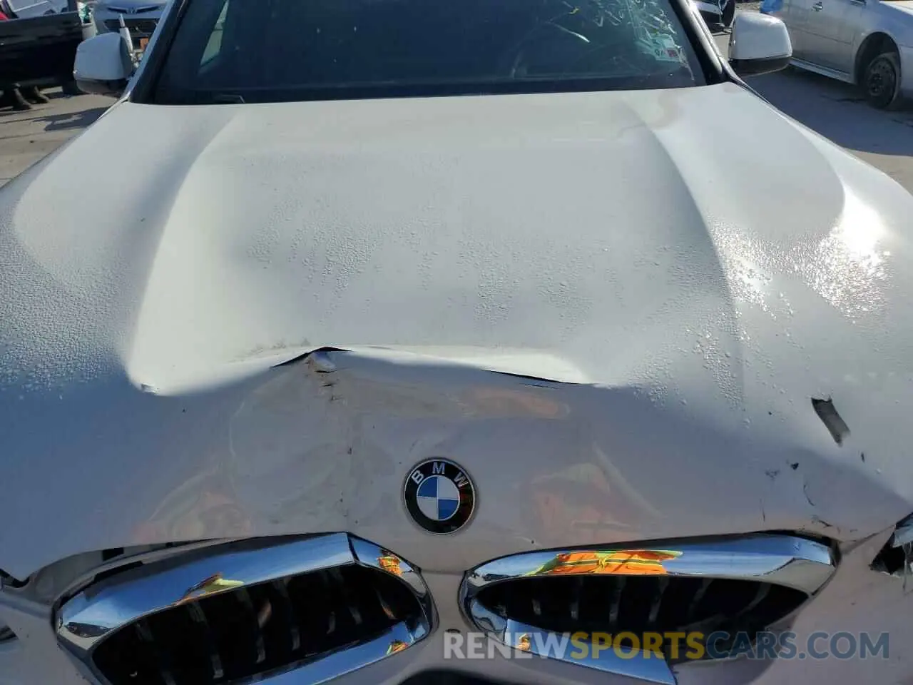 12 Photograph of a damaged car 5UXTR7C5XKLF23998 BMW X3 2019
