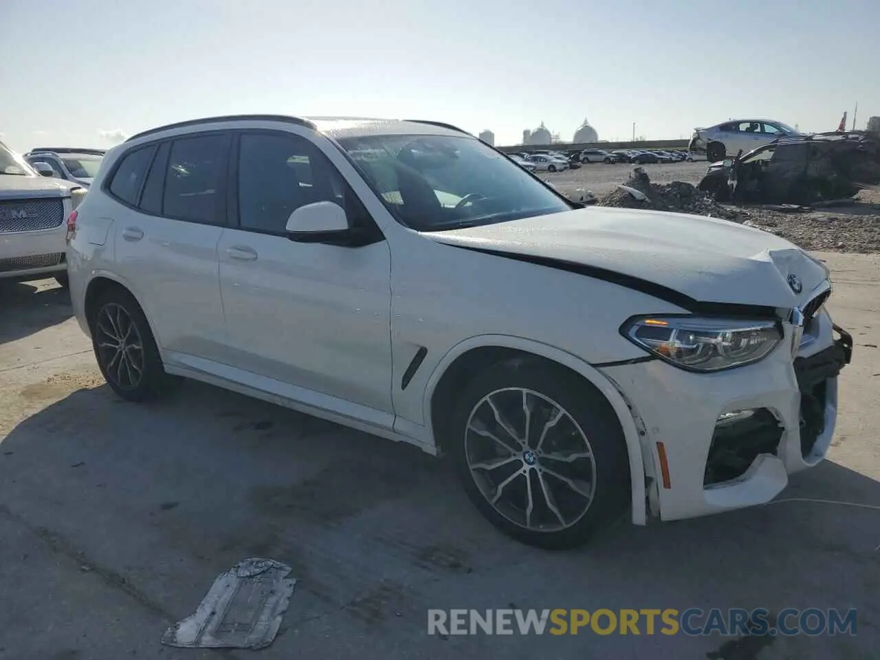 4 Photograph of a damaged car 5UXTR7C5XKLF23998 BMW X3 2019
