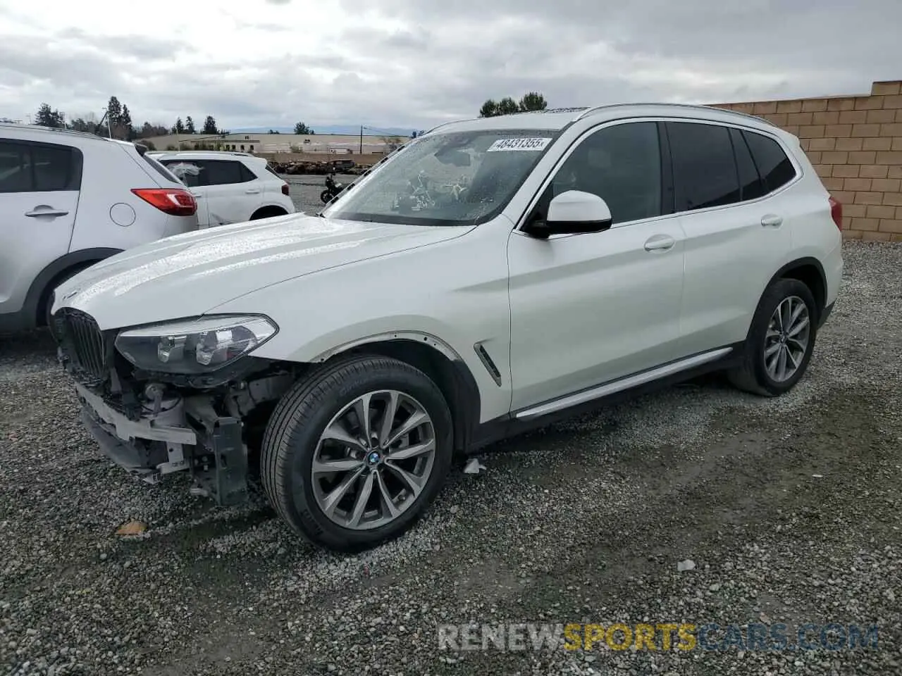 1 Photograph of a damaged car 5UXTR7C5XKLF28330 BMW X3 2019