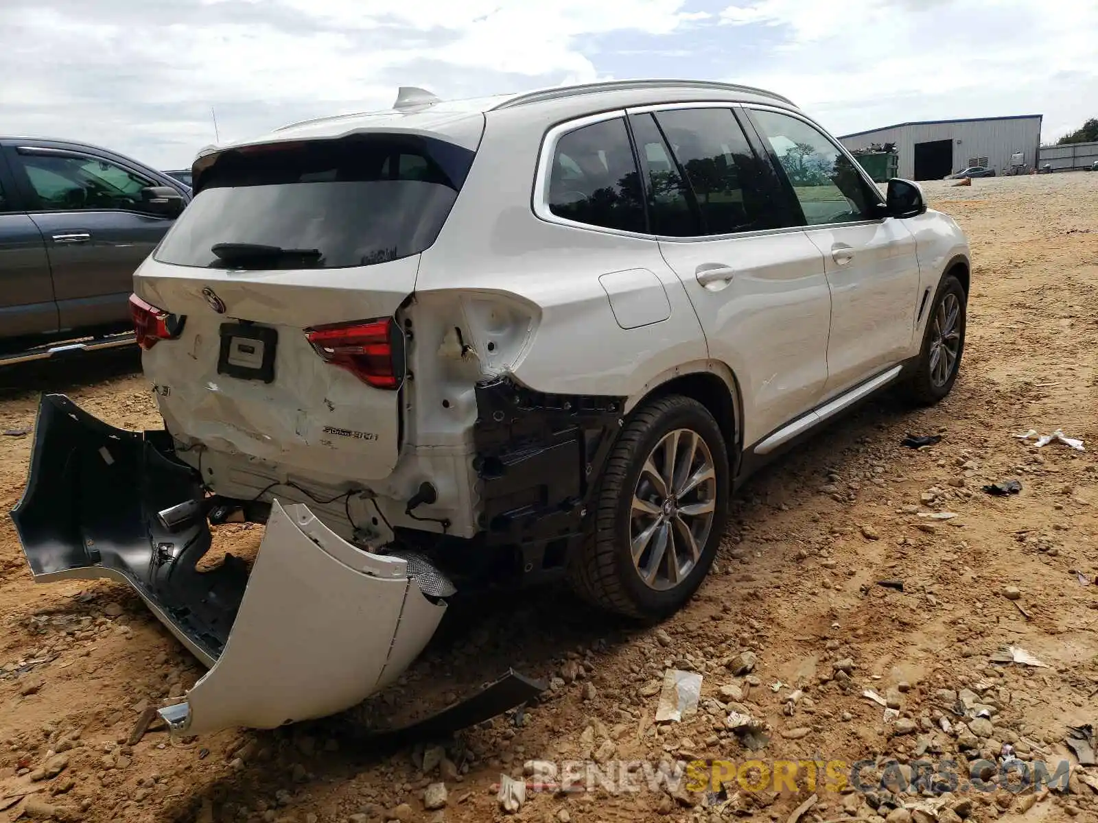 4 Photograph of a damaged car 5UXTR7C5XKLF30935 BMW X3 2019