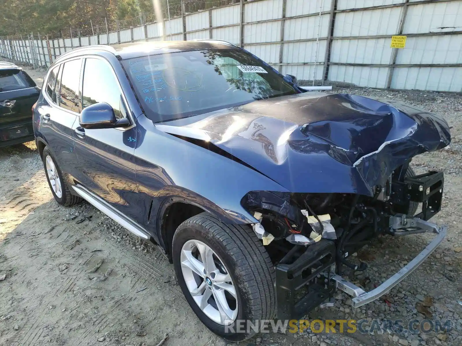 1 Photograph of a damaged car 5UXTR7C5XKLF32104 BMW X3 2019