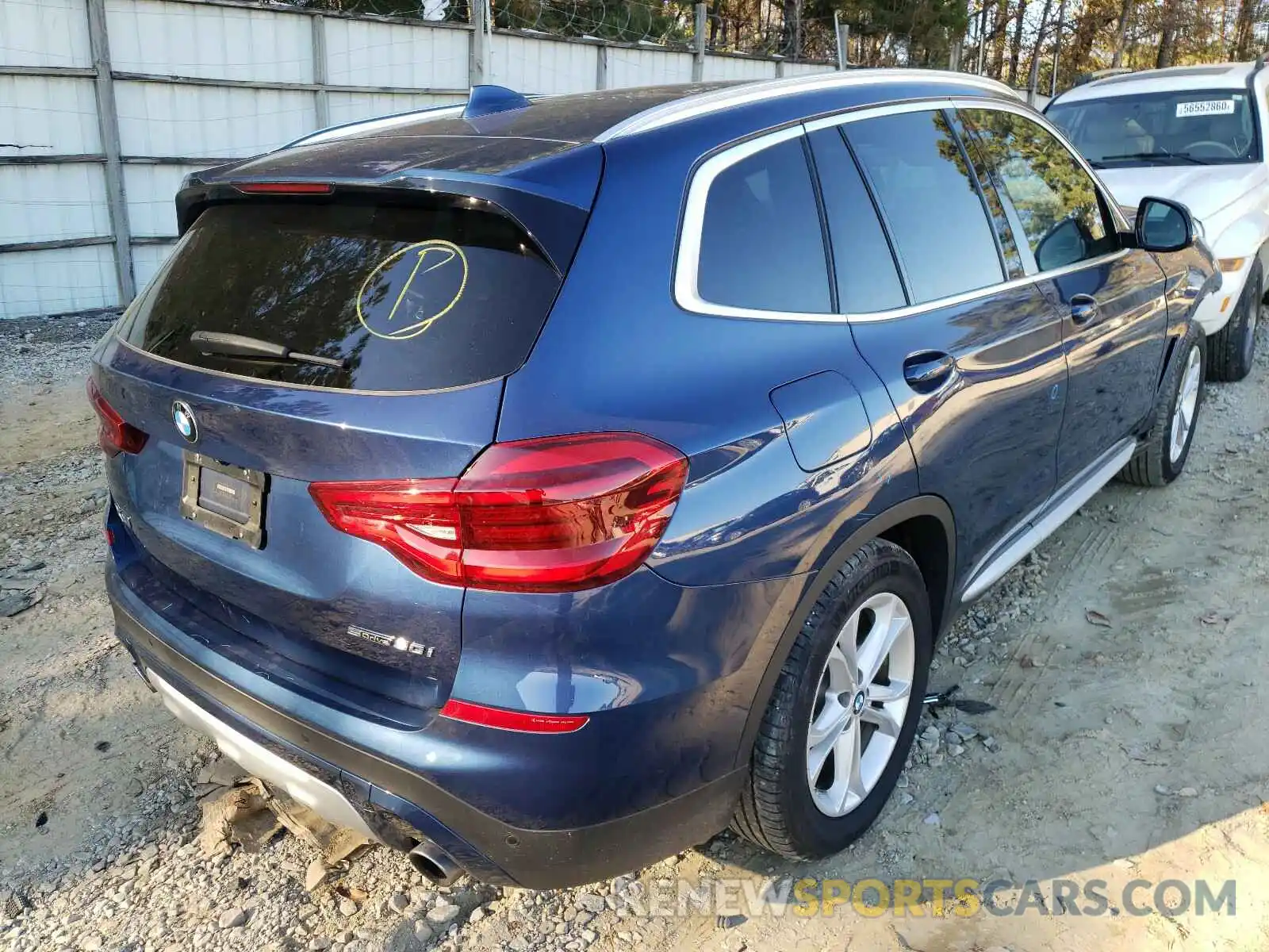 4 Photograph of a damaged car 5UXTR7C5XKLF32104 BMW X3 2019