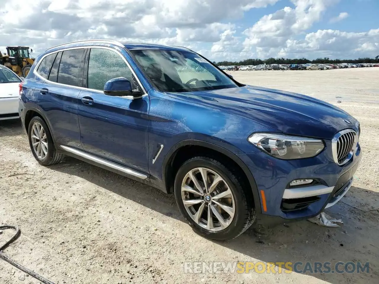 4 Photograph of a damaged car 5UXTR7C5XKLF33026 BMW X3 2019