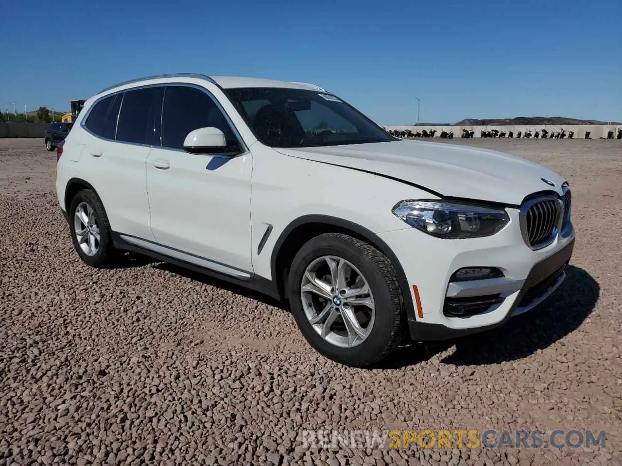4 Photograph of a damaged car 5UXTR7C5XKLF33401 BMW X3 2019