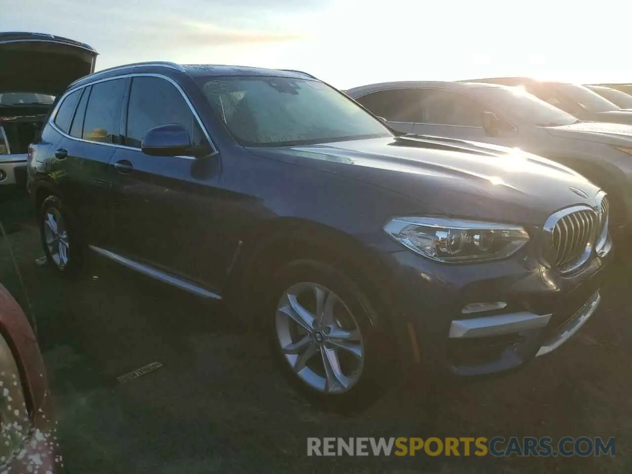 4 Photograph of a damaged car 5UXTR7C5XKLF33754 BMW X3 2019