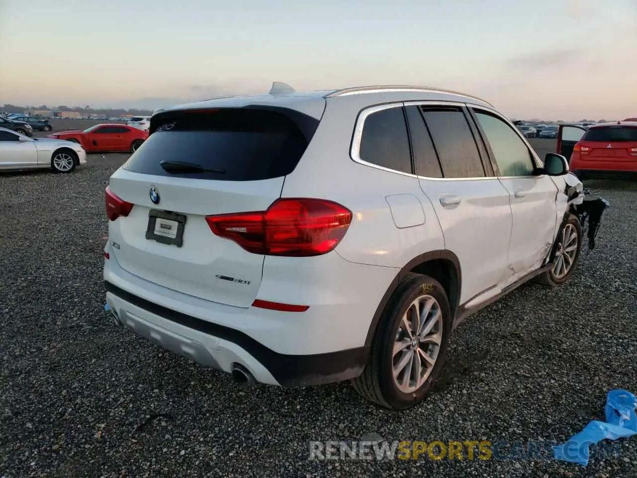 4 Photograph of a damaged car 5UXTR7C5XKLF36072 BMW X3 2019