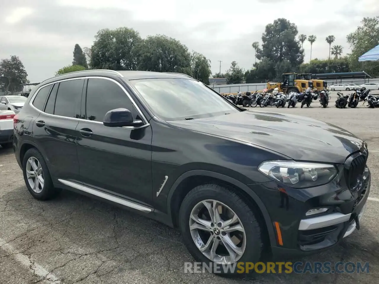 4 Photograph of a damaged car 5UXTR7C5XKLF36623 BMW X3 2019