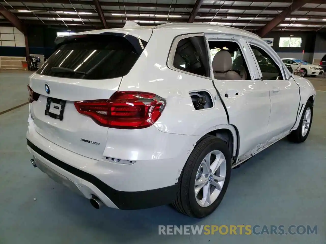 4 Photograph of a damaged car 5UXTR9C50KLP82752 BMW X3 2019