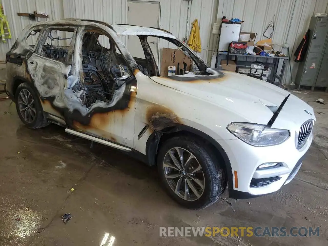 4 Photograph of a damaged car 5UXTR9C50KLP97705 BMW X3 2019