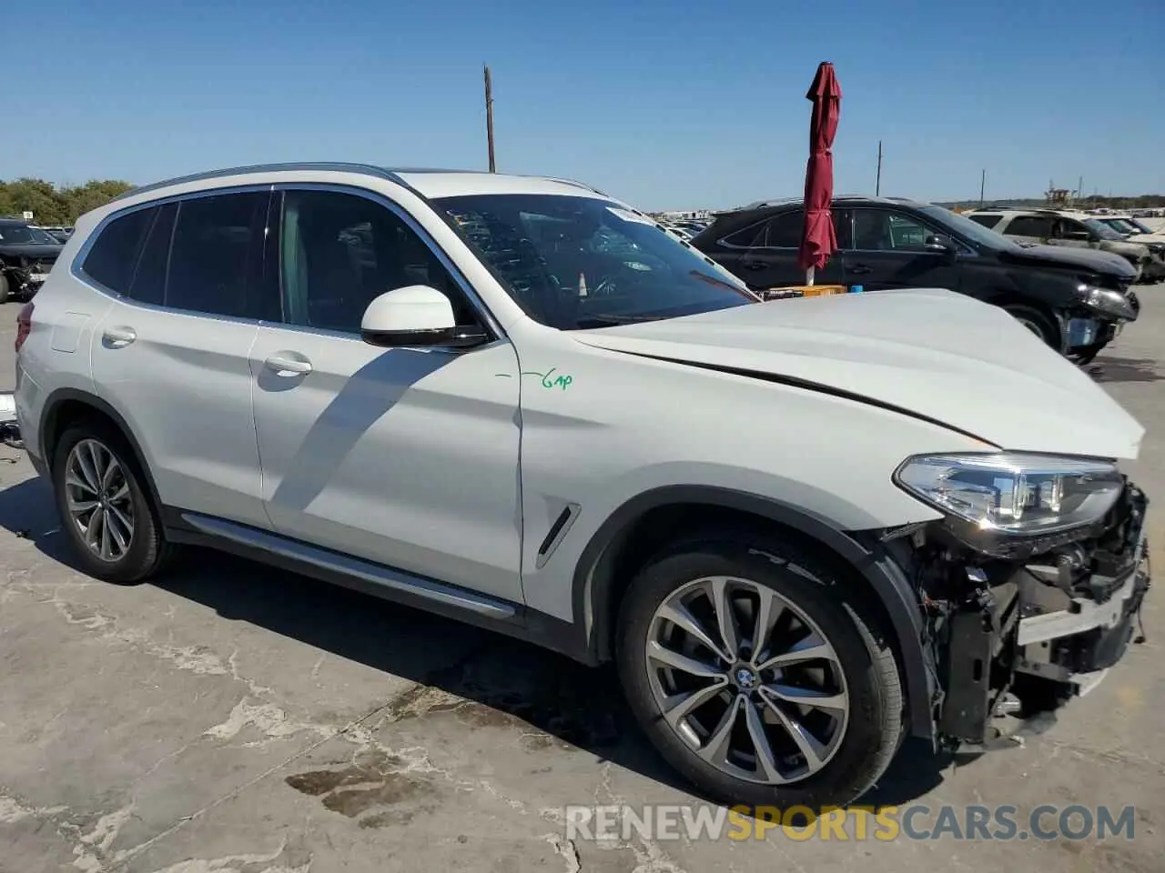4 Photograph of a damaged car 5UXTR9C52KLP92876 BMW X3 2019