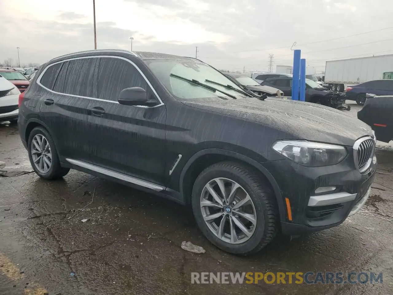 4 Photograph of a damaged car 5UXTR9C54KLP77408 BMW X3 2019